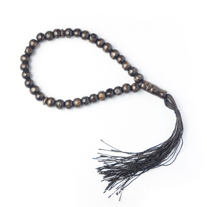 33 Zan Beads A Muslim Holds A prayer Bead Of Theisbihazan Beads For Islamic Worship
